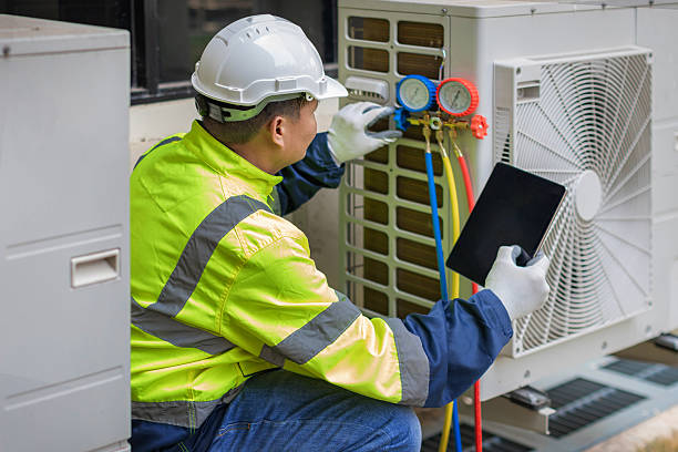 Professional Hvac technician working in Adel, IA